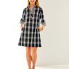 Woman in plaid dress