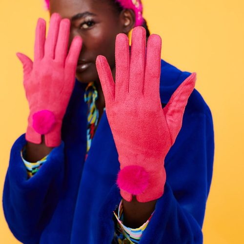 Woman in hot pink faux suede faux fur gloves