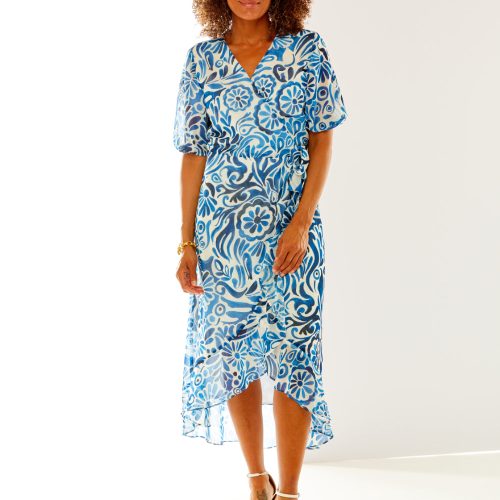 Woman in paisley print dress