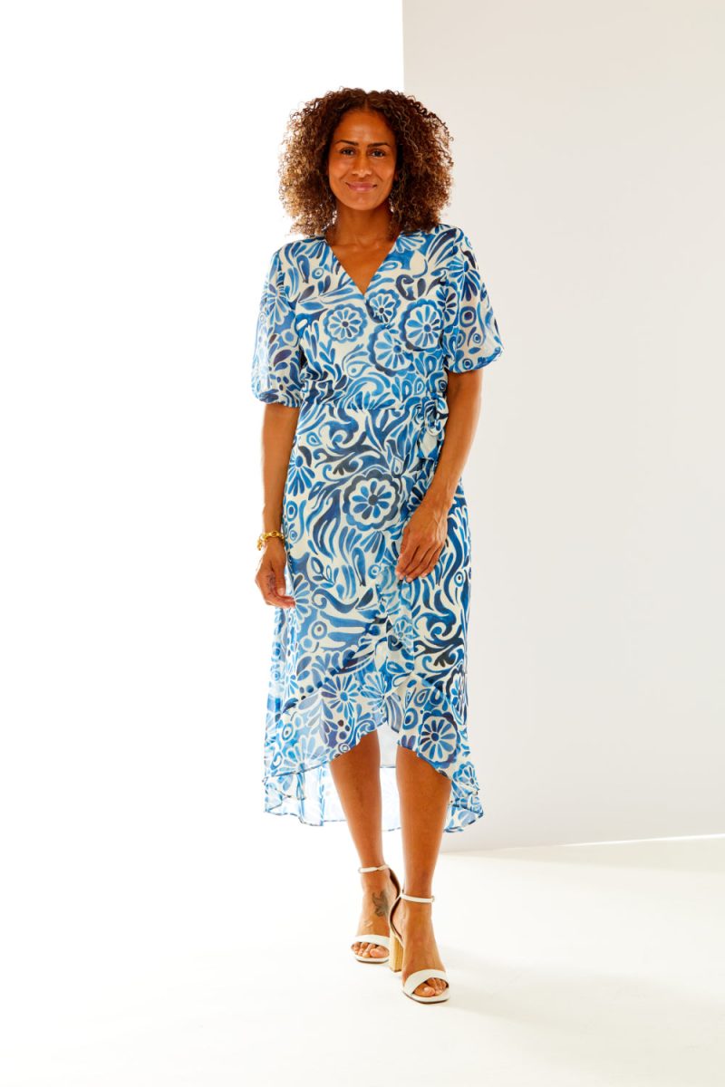 Woman in paisley print dress