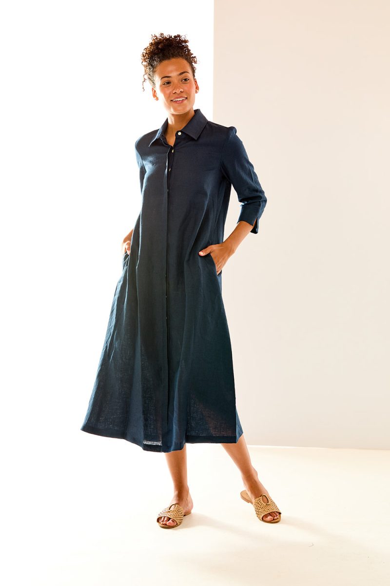 Woman in navy maxi linen dress