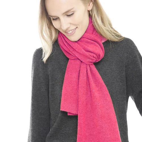 Woman in pink hibiscus cashmere scarf