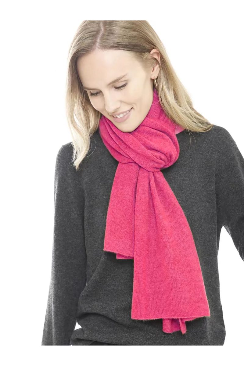 Woman in pink hibiscus cashmere scarf