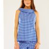 Woman in blue and white gingham top