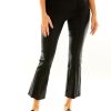 Woman in black bootcut pant