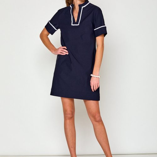 Woman in navy short sleeve dress