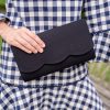 Black scallop clutch