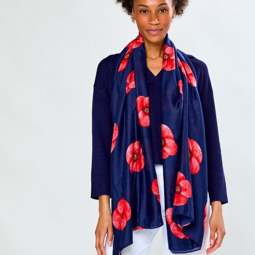 Woman in navy poppy scarf