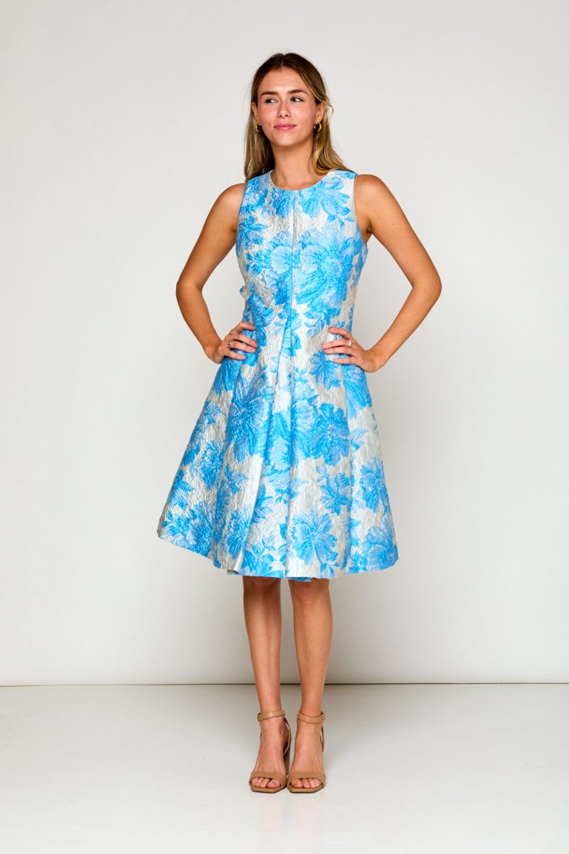 Woman in blue floral dress