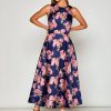 Woman in navy floral dress