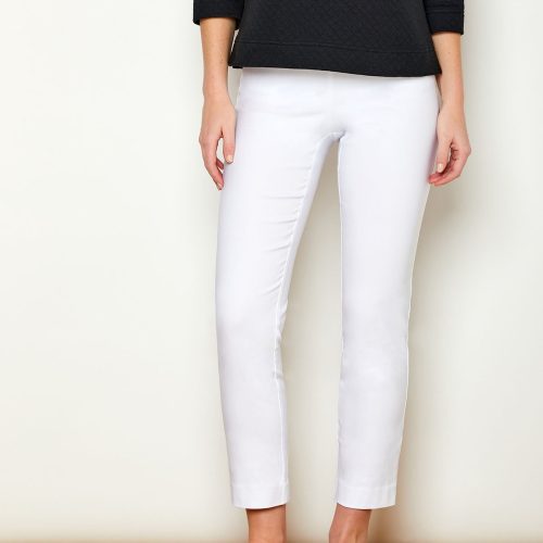 Woman in fitted white pants