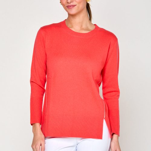 Woman in coral sweater