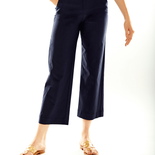 Woman wearing navy pants