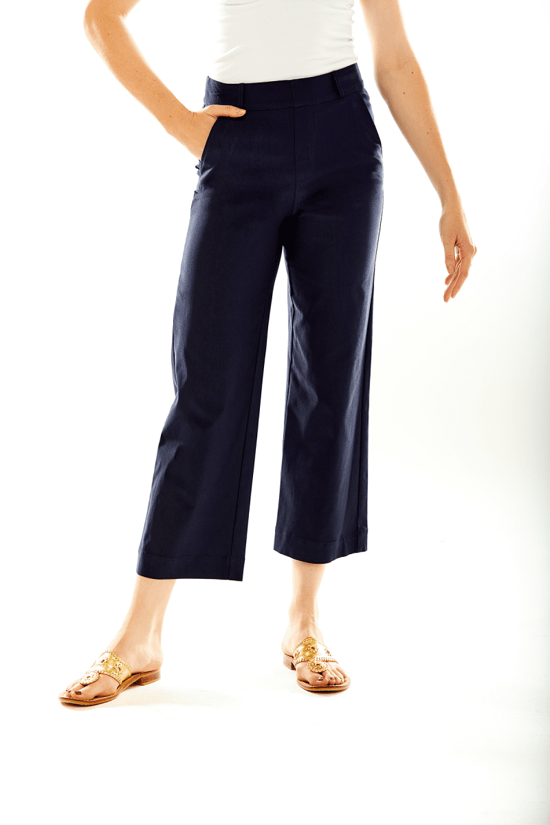 Woman wearing navy pants