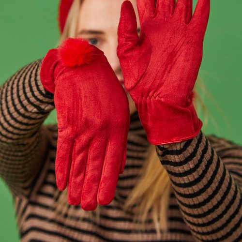 Woman in red faux suede faux fur gloves