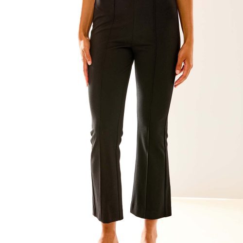 Woman in black ponte pant