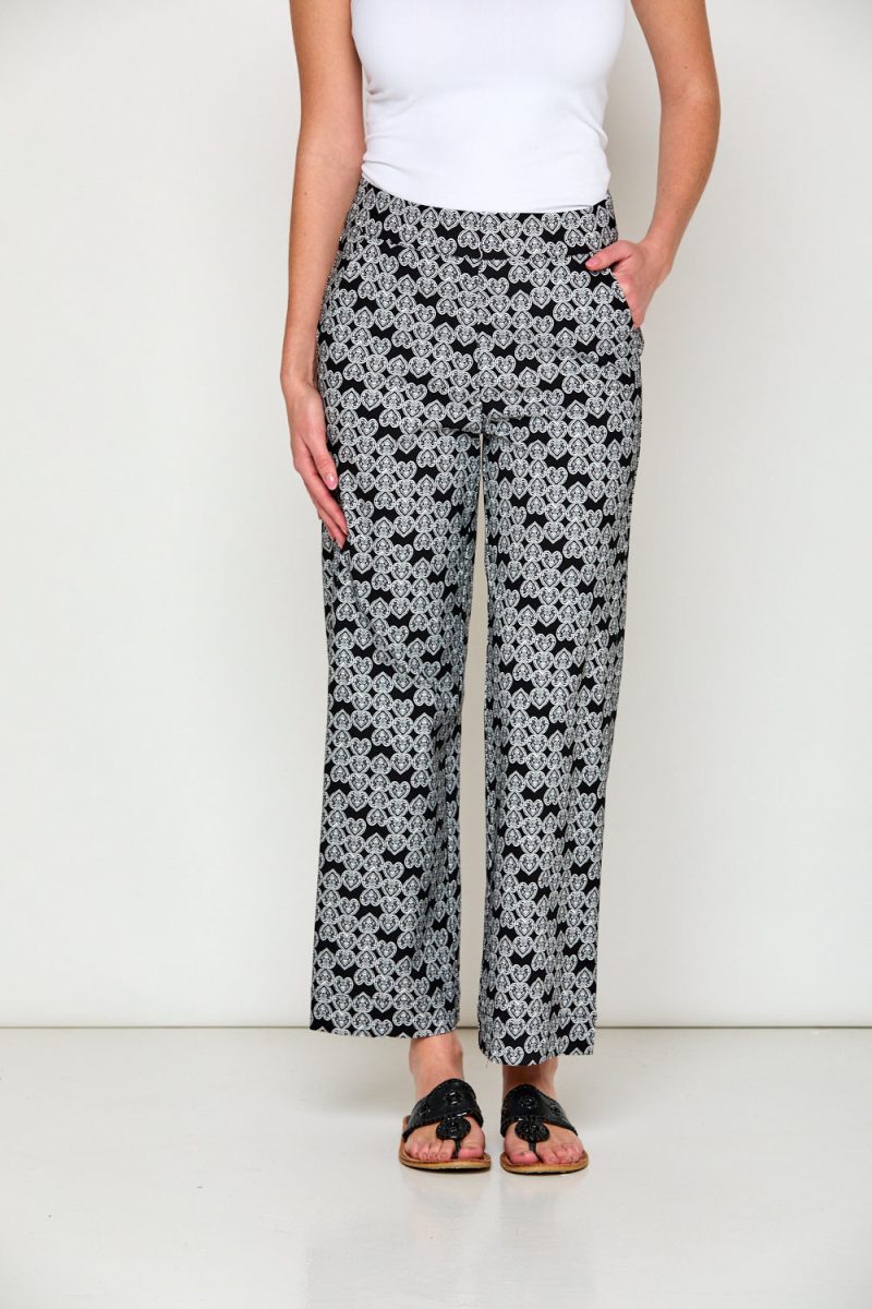 Woman in black and white print pants