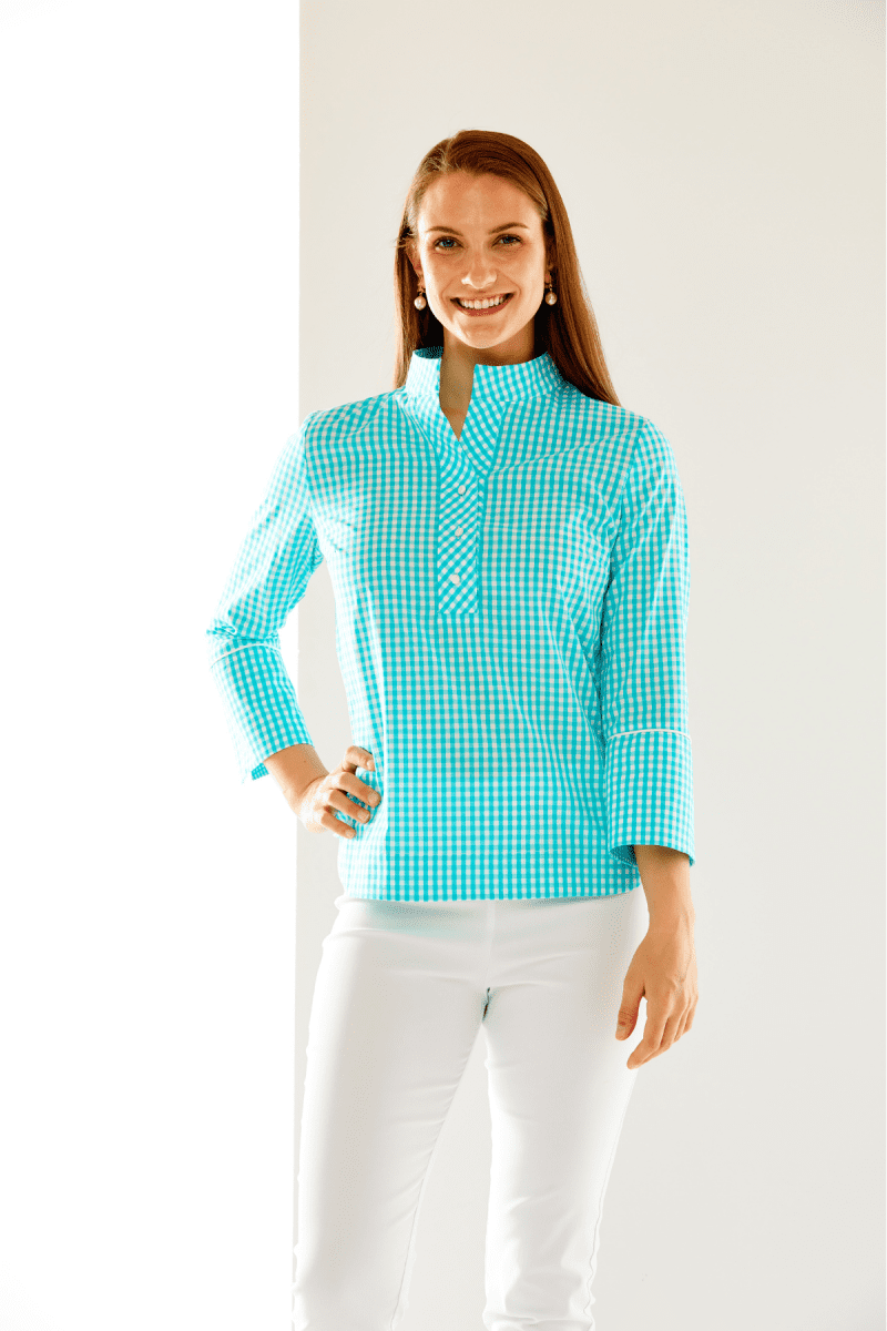 Woman in aqua gingham top