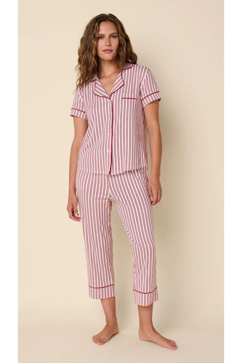 Woman in red and white striped pajamas