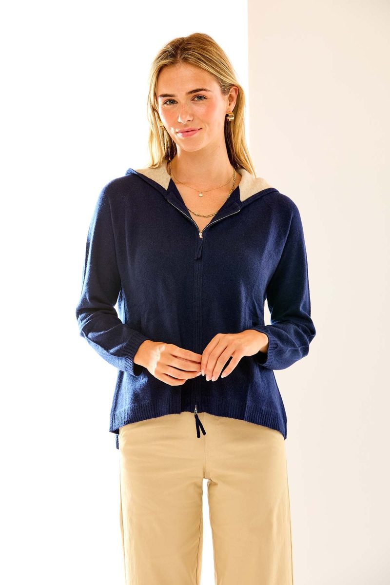 Woman in navy cashmere hoodie