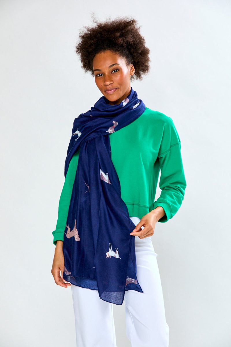 Woman in navy dog scarf