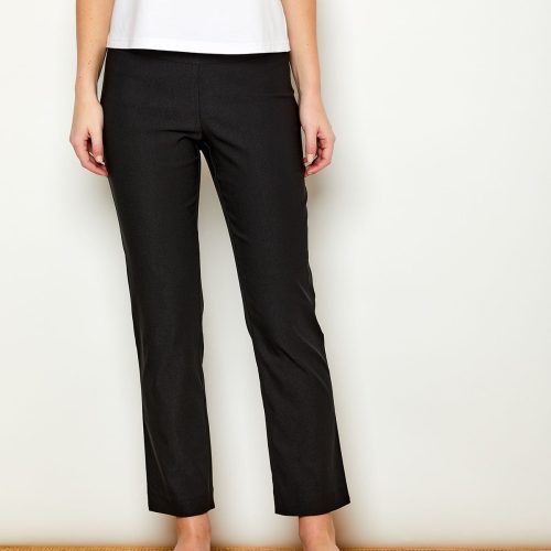 Woman in fitted black colored pants