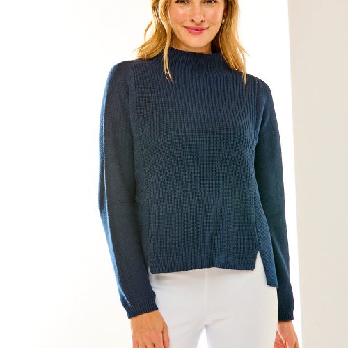 Woman in mock neck sweater