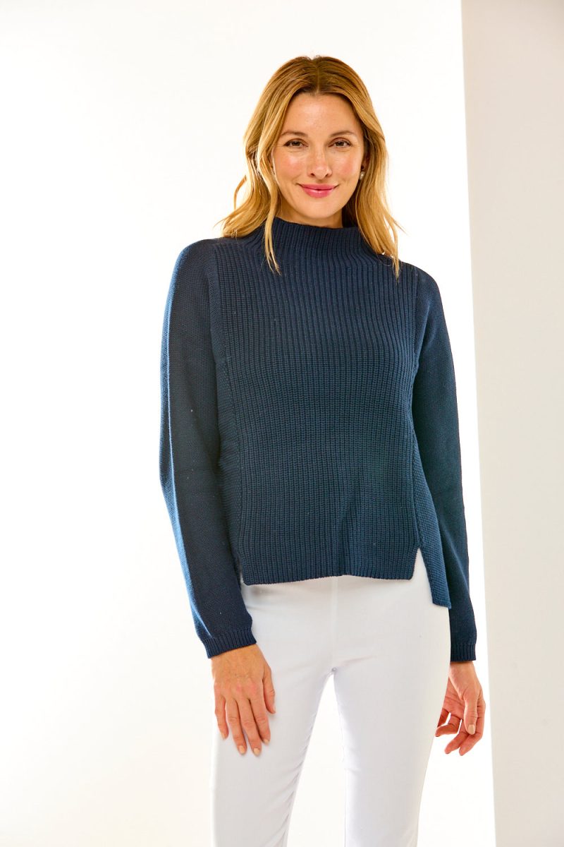 Woman in mock neck sweater