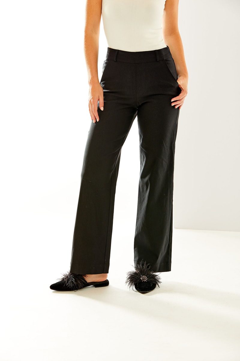 Woman in long black pants