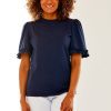 Woman in navy top