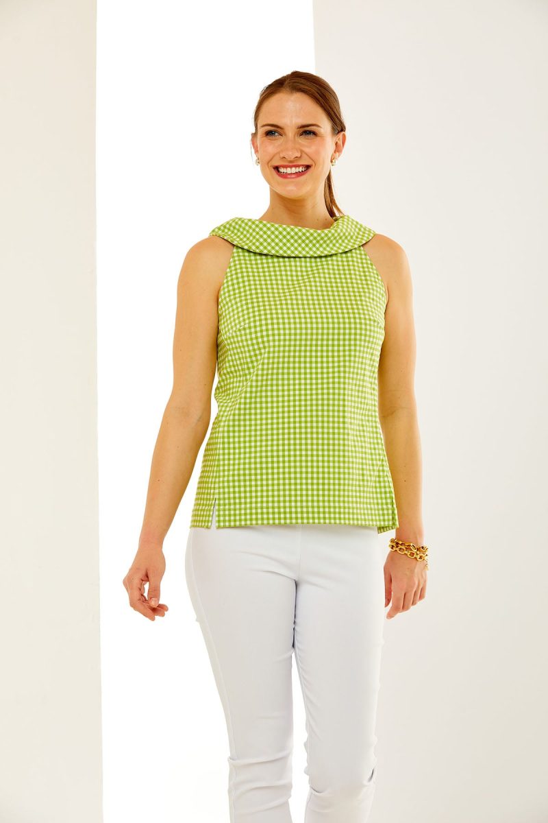 Woman in green and white gingham top