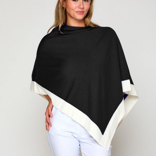 Woman in tipped poncho