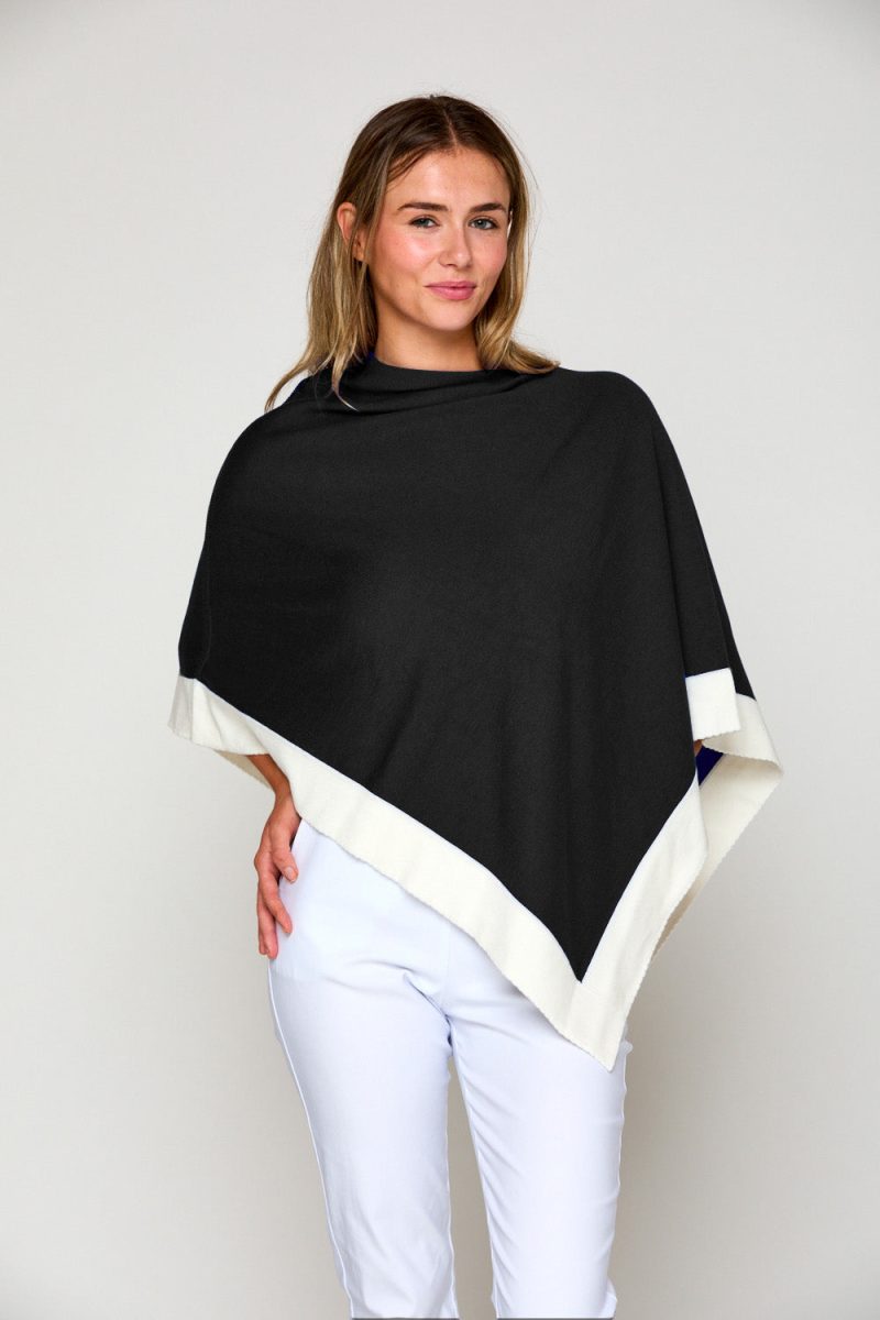 Woman in tipped poncho